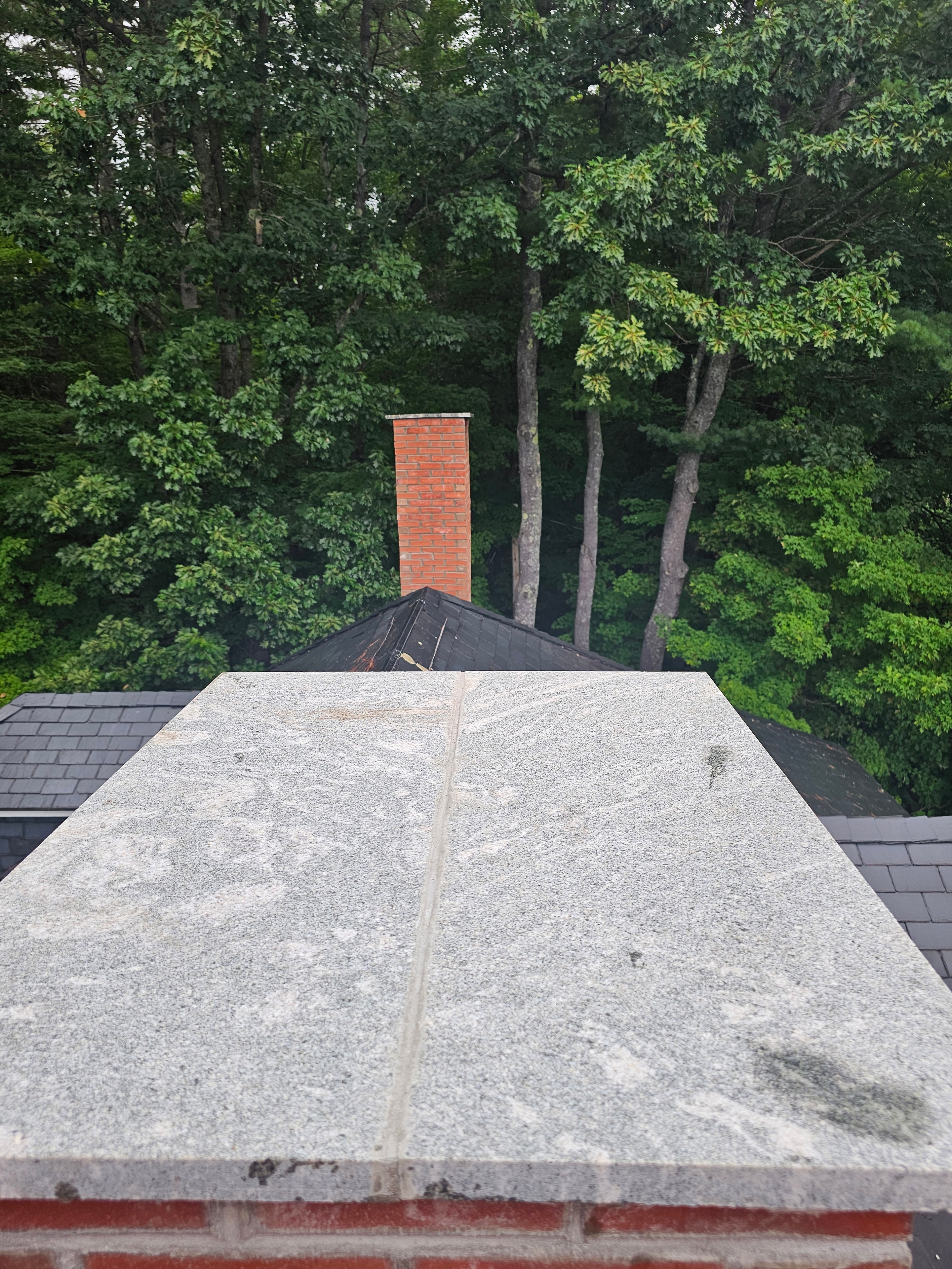 Chimney after restoration — new cap installed
