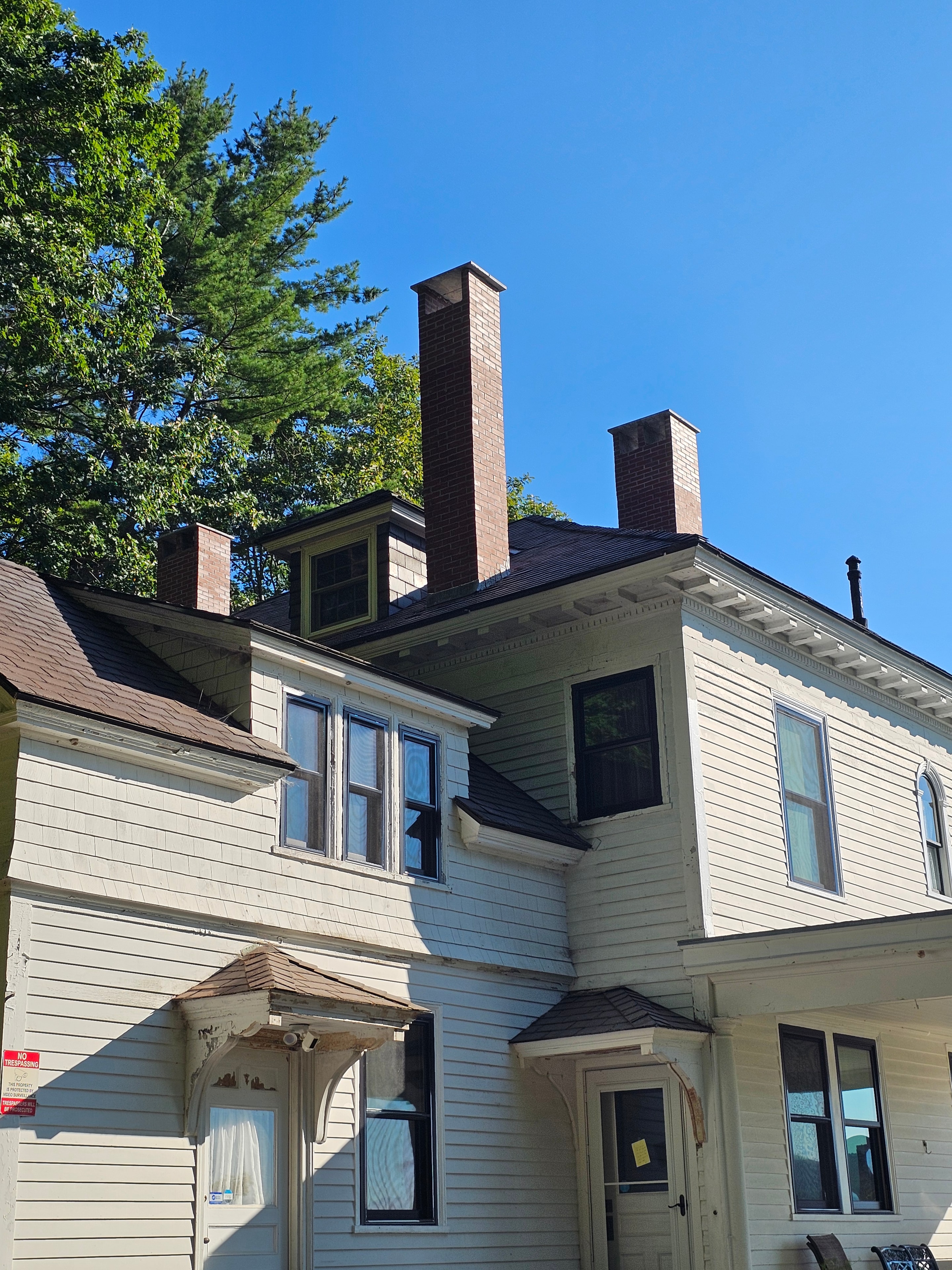Chimney after restoration — repointed mortar joints