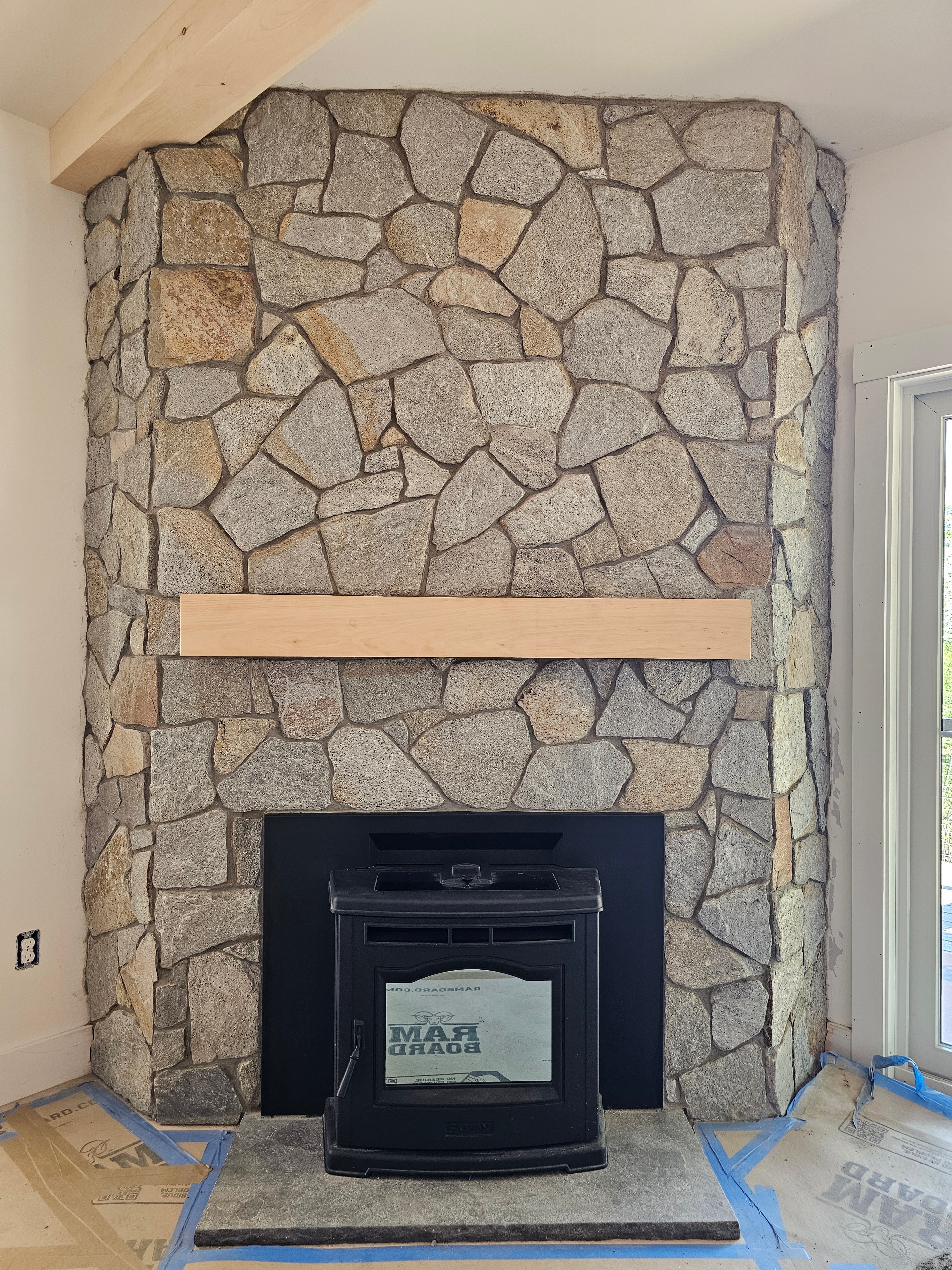 Stone foundation completed by Malone Masonry